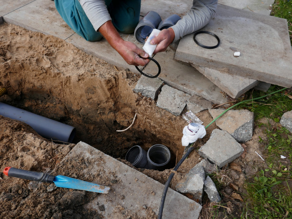 Laying and installation of a PVC sewer pipe